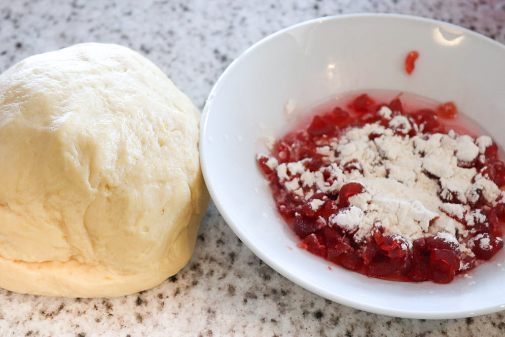 Yeast dough with candied and marinated cherries