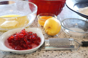 Ingredients for a yeast ring cake with candied cherries